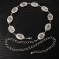 Detailed close-up of retro silver metal waist chain with elegant engraved oval links. - X1202-1 (Silver)