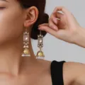 Close-up detail of vintage gold ethnic jhumka earrings featuring pink crystal and pearls. - Square Rhinestone Tassel Style (weh6384) / Pink Antique Gold