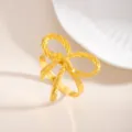 Anello portatovagliolo con fiocco in lega dorata per decorazione tavola dettaglio. - Fiocco (X1132-8)