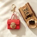 Mini sac porte-clés rouge motif crocodile, étui pour écouteurs et porte-monnaie tendance. - Rouge