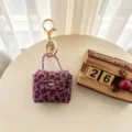 Mini peluche imprimé léopard porte-clés sac écouteur rétro duveteux sac à main pendentif - Fuchsia