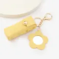 Porte-clés étui rouge à lèvres en cuir jaune avec joli pendentif miroir fleur affichage. - Jaune