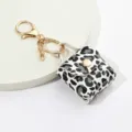 Porte-clés mini sac motif léopard en cuir PU mignon porte-monnaie pendentif accessoire - Noir et Blanc