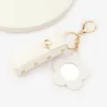 Étui à rouge à lèvres en cuir blanc avec porte-clés miroir fleur, accessoire mini élégant. - Blanc