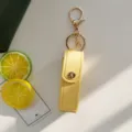 Astuccio per rossetto in pelle PU gialla portachiavi ciondolo borsa portatile mini - Giallo