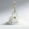 Porte-clés mini sac en cuir blanc avec quincaillerie dorée, charm mignon pour sac à main. - Blanc