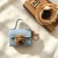 Mini krokodil textuur slot sleutelhanger tas draagbare oortelefoon muntzak accessoire - Blauw