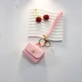 Etui mini ecouteurs en cuir rose porte-cles, petit porte-monnaie mignon avec bracelet. - Rose