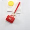 Mini sac à main en cuir rouge porte-clés étui écouteurs mignon pendentif de sac. - Rouge