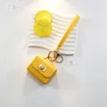 Petit Sac Écouteur en Cuir Jaune Porte-clés avec Dragonne et Porte-monnaie. - Jaune