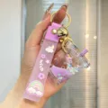 Cute cartoon liquid bubble tea keychain with unicorn and rainbow pendant for keys or bag. - Purple