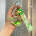Süßer Bubble Tea Flüssig Treibsand Schlüsselanhänger Acryl Taschenanhänger für Alltag. - Grün