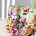 Double wall glass coffee mug with colorful dried flowers inside, perfect aesthetic gift for women. - Blue Grass Gypsophila