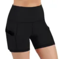 Close-up detail of high-waist women sports yoga shorts with convenient side pockets. - S / Bottoms / Black