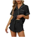 Black satin short sleeve pajama set with white piping and cute ruffle shorts for women. - S / Black