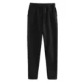 Casual fleece sweatpants for men and women detail view, featuring comfortable drawstring waist. - S / Black