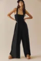 Schwarzer ärmelloser trägerloser Jumpsuit, gerafftes Oberteil und weite Hosen Detail. - S / Schwarz