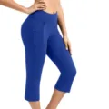 High waist royal blue yoga pants detail showing side pocket and hip lifting fit, close-up view. - S / Blue