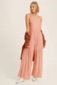 Eleganter rosa ärmelloser Jumpsuit mit weitem Bein und gesmoktem Oberteil für Damen. - S / Rosa