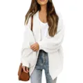 Detailed view of womens chunky knit cardigan featuring cozy lantern sleeves and open front. - S / White