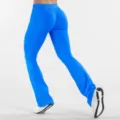 Detailed view of bright blue high waist seamless flare yoga pants, butt lifting fitness activewear. - XS / Electric Blue