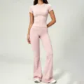 Pink ribbed short sleeve crop top and high-waisted flared yoga pants fitness set. - Dream Pink