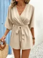 Details of stylish beige V-neck short sleeve romper with waist tie in summer scene. - S / Set / Apricot