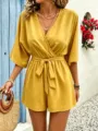 Summer women elegant fashion V-neck solid color jumpsuit detail view, stylish casual wear. - Yellow