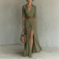 Detailed view of the olive green shirt dress, featuring high waist pleats and stylish brown belt. - S / Dark Green