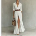 Detailed view of white long sleeve shirt dress with belt, elegant maxi dress design. - S / White