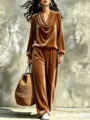 Detailed shot of the brown velvet cowl neck top and straight trousers set in stylish wear. - S / Top And Bottom (YG2619) / Dark Brown