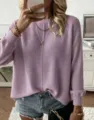 Detail shot of women's solid color round neck long sleeve knit pullover sweater in lavender. - S / Tops / Violet