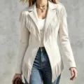 Detail view of the beige suede fringe lapel jacket, showcasing the texture and stylish hem. - S / Tops / White