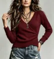 Detailed view of women's V-neck long sleeve knit sweater, solid color slim fit pullover top. - Burgundy