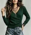 Dark green V-neck long sleeve knit sweater detail view showing ribbed cuffs and texture. - Dark Green