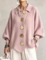 Close-up of pink knit cardigan with large gold buttons, lapel collar, and lantern sleeves. - S / Tops / Pink