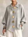 Grey knit cardigan featuring lapel collar, large gold buttons and cozy lantern sleeves. - Light Gray