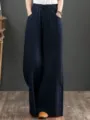 Detailed view of dark blue linen wide leg trousers, high waist casual loose pants. - Navy Blue
