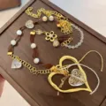 Y2K style handmade ribbon spliced crystal heart sweater chain detail, retro chic necklace. - Hollow Heart Woven Necklace / Gold
