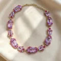 Vintage crystal statement necklace with large purple stones and gold-tone chain for women. - Amethyst Necklace