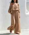 Casual beige off-shoulder top and wide leg linen pants set, elegant women outfit detail view. - Camel