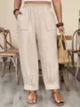 Dettaglio pantaloni carota larghi, vita alta e grandi tasche per moda donna casual elegante. - 1XL / Pantaloni e gonne / Kaki
