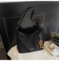 Black suede tote bag for women, retro commuter shoulder bag with beaded charm and metal buckle. - With Pendant / Black