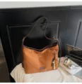 Brown vintage suede shoulder bag with bead pendant, stylish hobo purse for daily commuting. - With Pendant / Brown