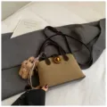 Retro suede patchwork top-handle shoulder bag with cute puppy charm for women daily use. - Green with Charm