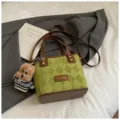 Retro green quilted shoulder bag for women, stylish top handle handbag with cute plush charm. - With Pendant / Green