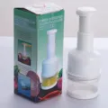 Manual garlic press and vegetable chopper for quick kitchen prep, white plastic design. - White Chopper