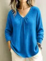 Blue ribbed V-neck long sleeve women top detail shot, casual loose fit knitwear apparel. - Blue