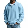 Detail of men's light blue waffle-knit long sleeve polo shirt, casual textured top. - Sky Blue