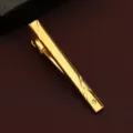 Detailed close-up of a stylish gold metal men tie clip with geometric engraving and rhinestone. - Long Geometric Style (New606)